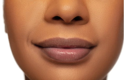 Mauve-nude lip look for dark skins