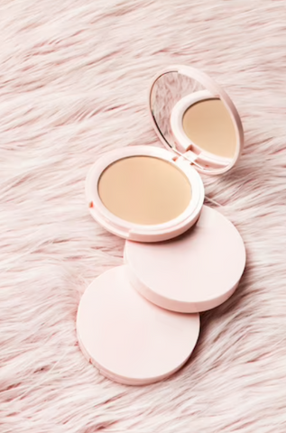 Pressed or compact powder