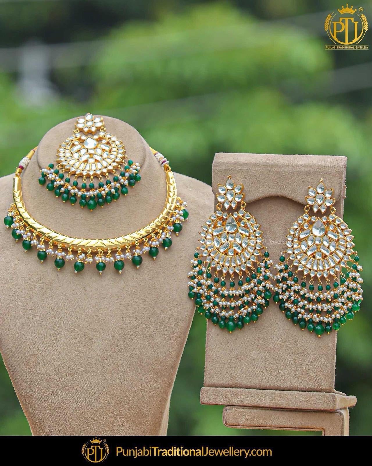 Gold Finished Emerald Kundan Hasli Set By Punjabi Traditional Jeweller