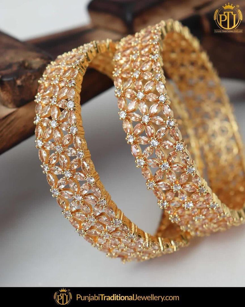 american diamond bangles in gold