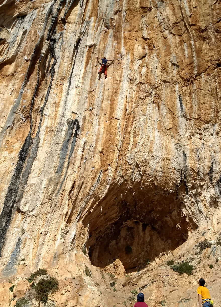 Singaporean climber on Tufandango 8a+, Twin caves