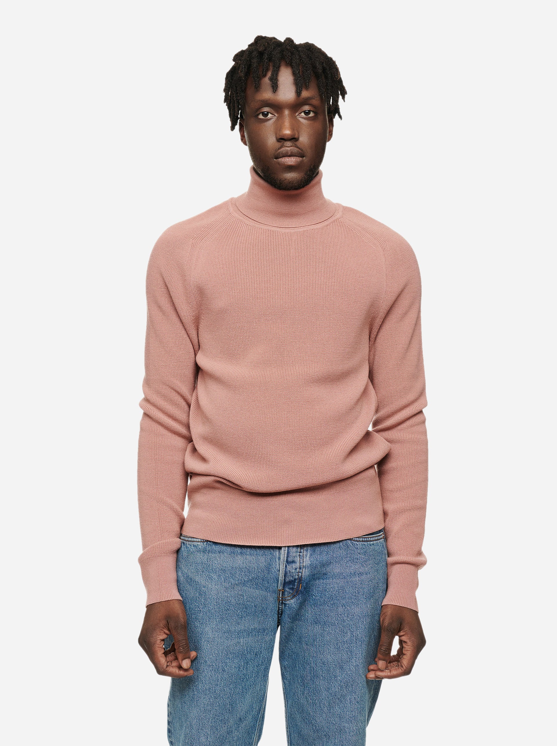 pink turtleneck sweater