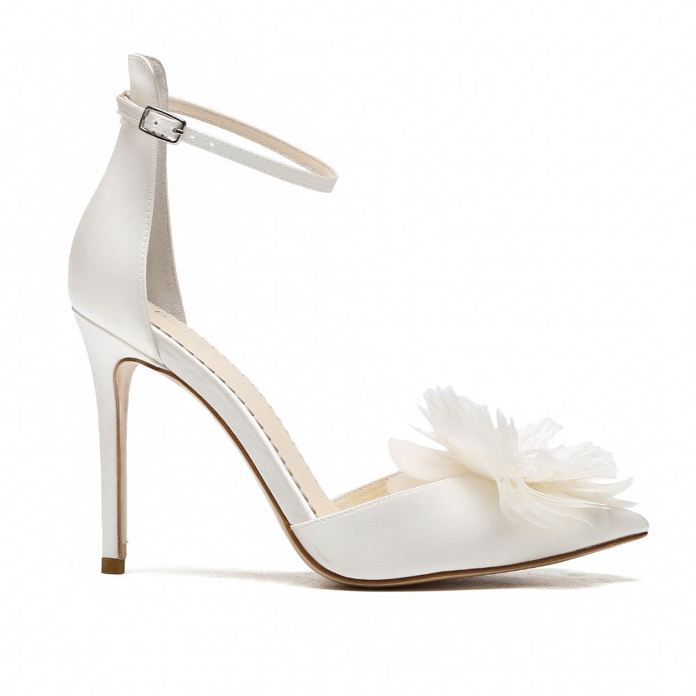 Ivory barbie heels for wedding with feathers and flowers