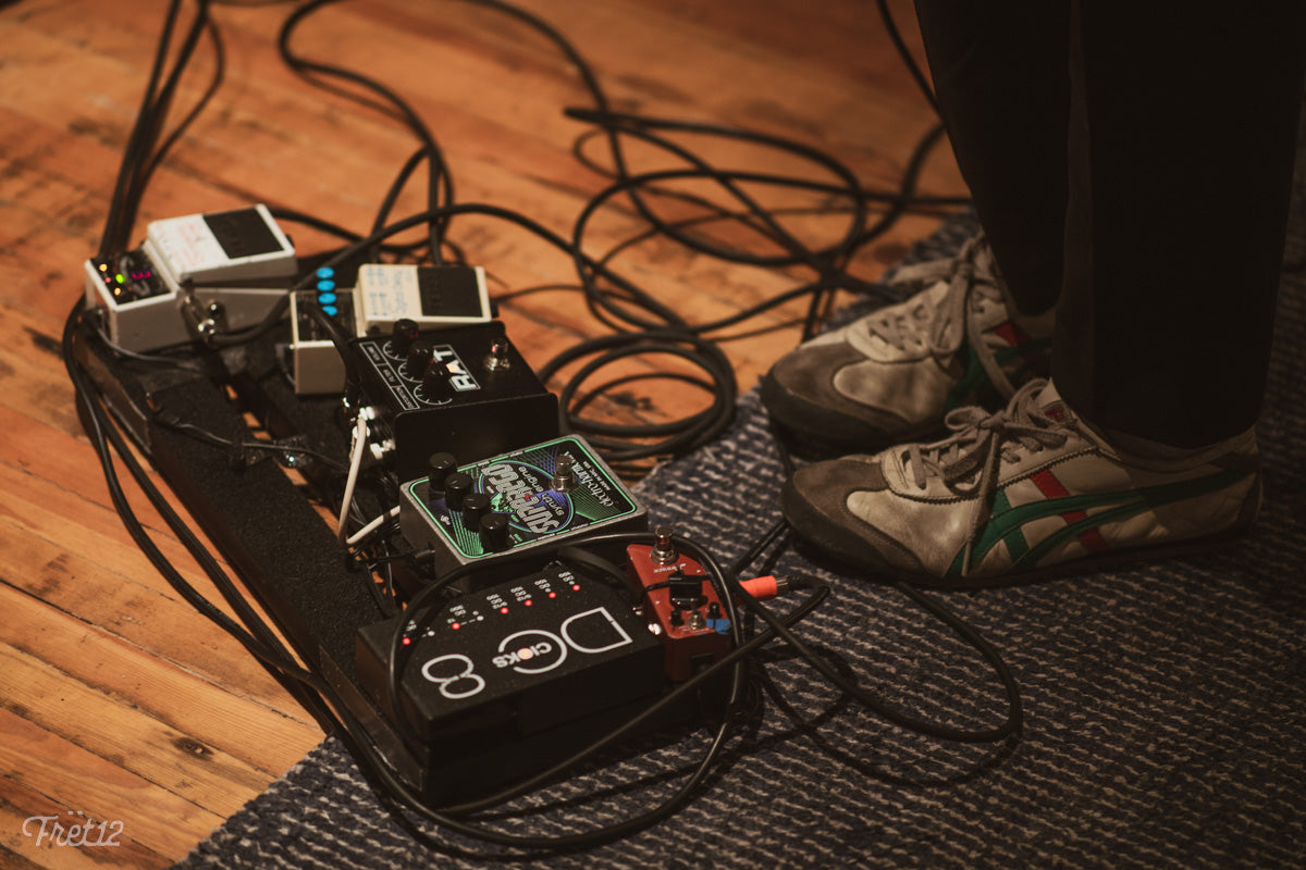 Kai Slater's pedalboard includes a RAT and an Electro-Harmonix Superego pedal.