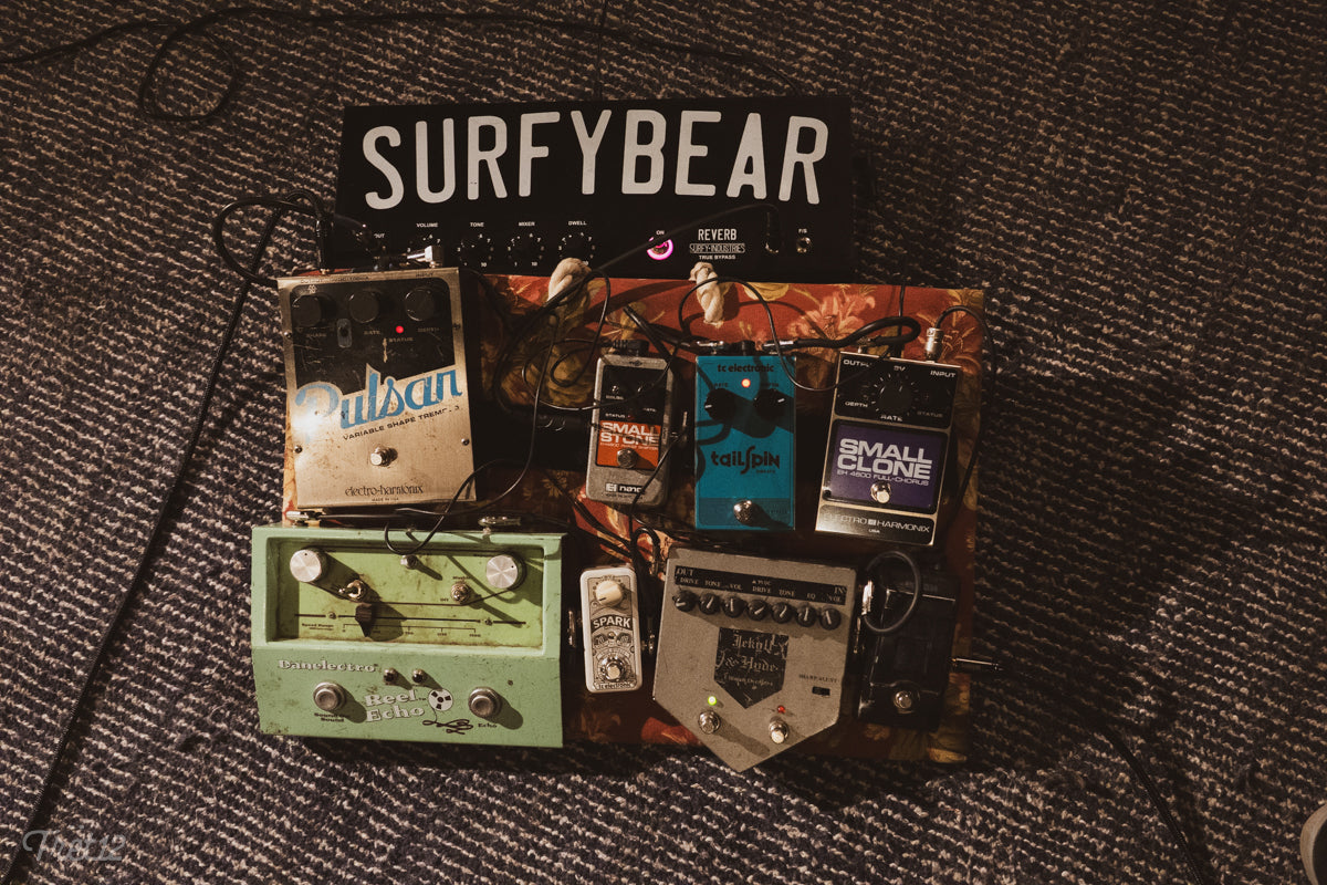 Surfy Industries, Electro Harmonix, and Danelectro effects pedals on Siul's pedalboard.