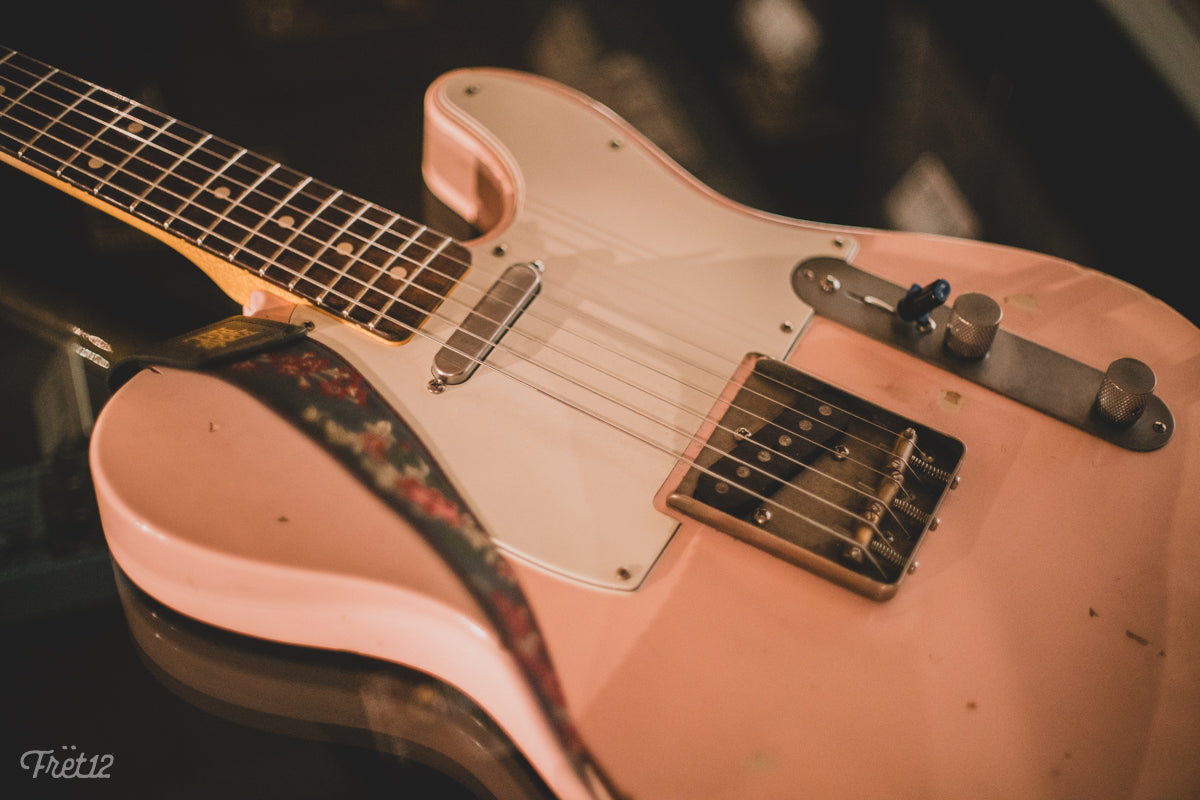 Justin Eisenbraun with his wife's Pink Nashguitars Telecaster.