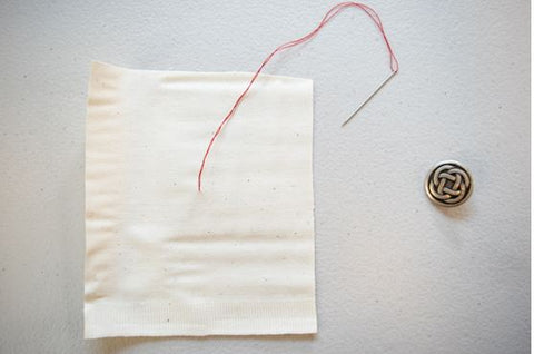 how to sew on a button with a shank 