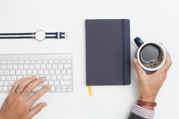 Hand typing on a keyboard