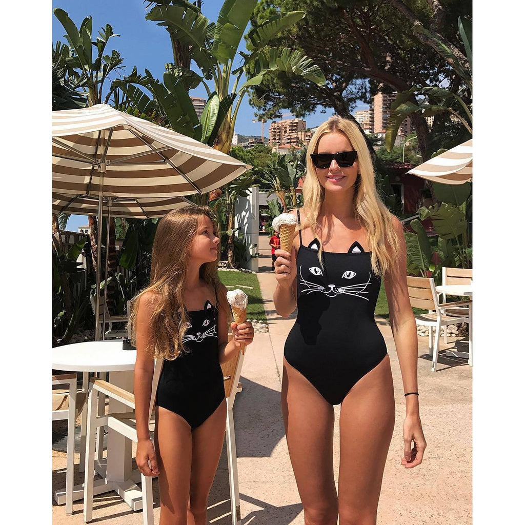 matching swimsuit mother and daughter