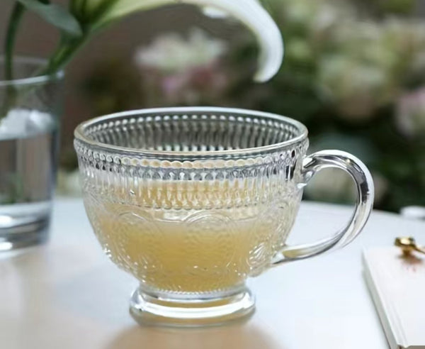 https://cdn.shopify.com/s/files/1/1559/1001/products/andreas-tea-cup-by-steepologie-387303_600x.jpg?v=1701090019