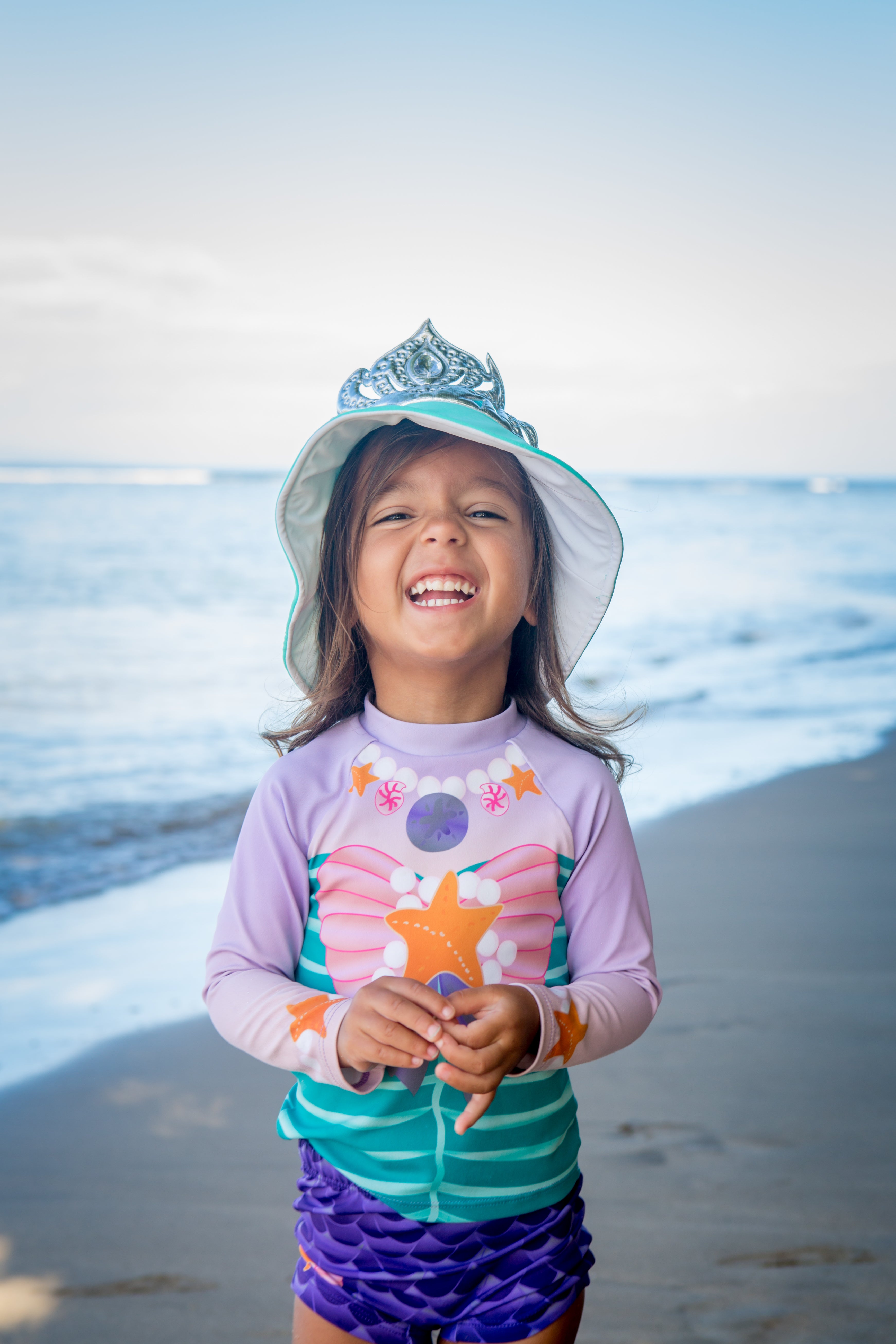 7 year old girl wearing uv protective swimwear