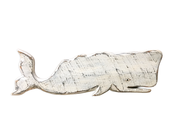 white wooden whale