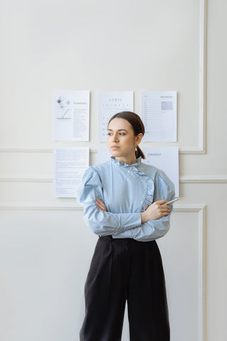 Woman Crossing Her Arms in Confidence