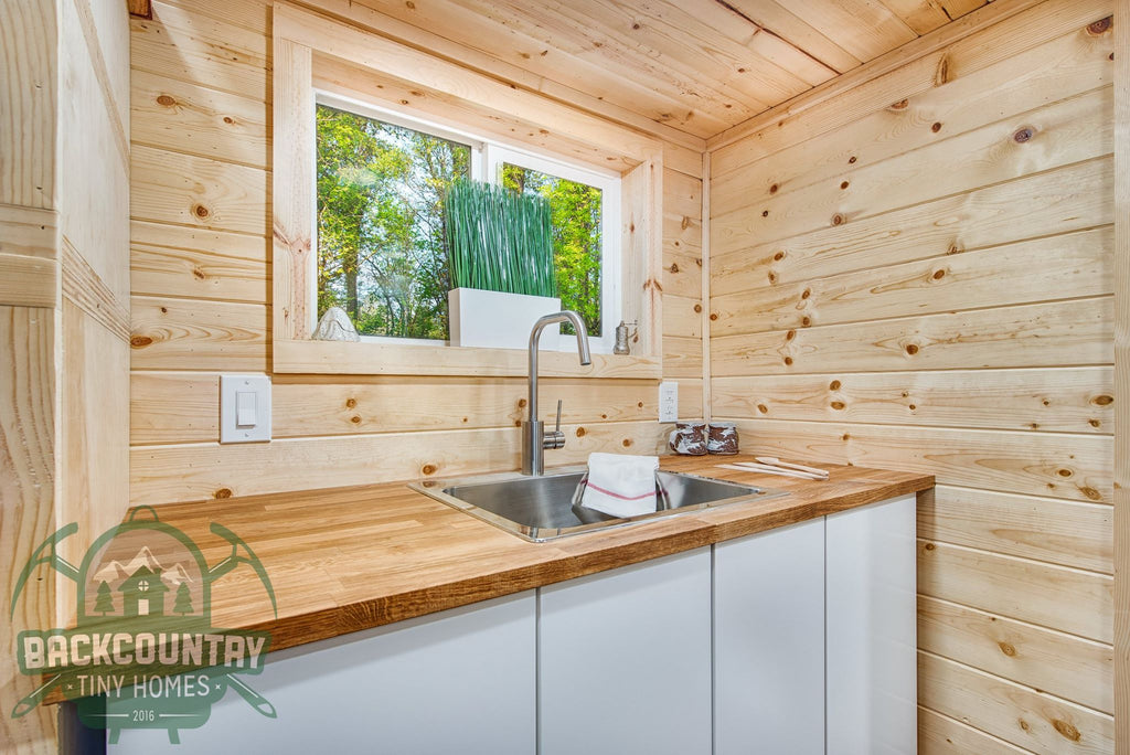 Basecamp Green Tiny House on Wheels by Backcountry Tiny Homes in Vancouver, WA