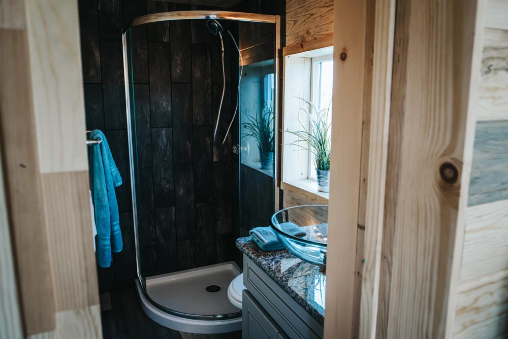 Rustic "Four Eagle" Tiny House on Wheels by The Tiny Home Co.