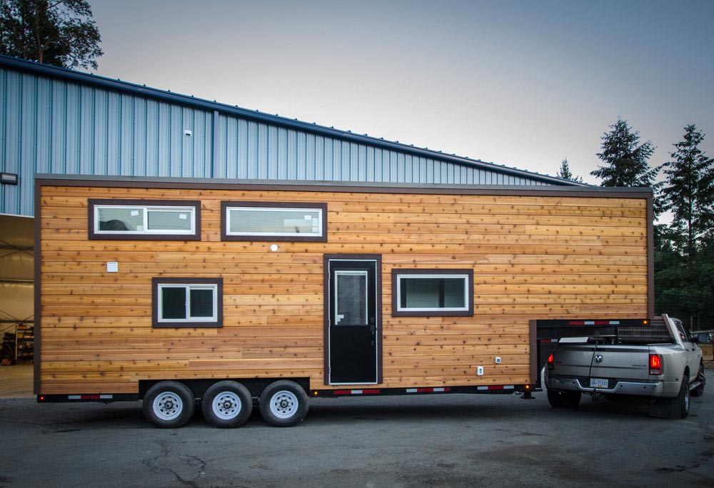 33’ “Starling” Gooseneck Tiny House on Wheels by Rewild Homes