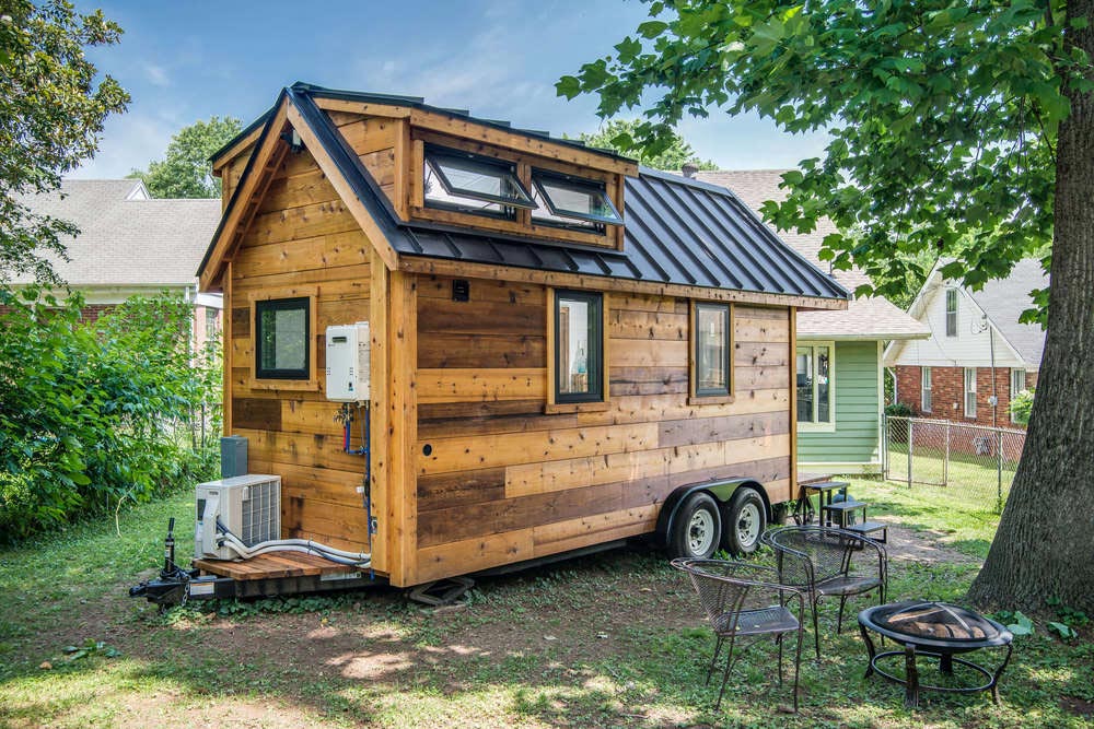 The Farmhouse Chic "Cedar Mountain Tiny House" by New Frontier Tiny Homes