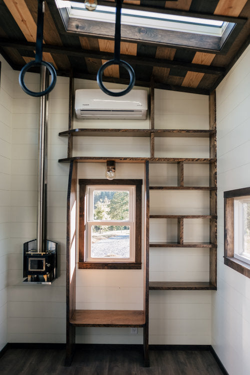 Silhouette Tiny House on Wheels with a Crossfit Gym by Wind River Tiny Homes