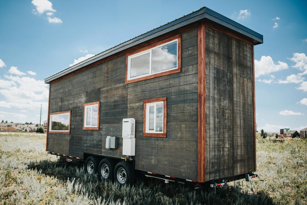 Rustic "Four Eagle" Tiny House on Wheels by The Tiny Home Co.