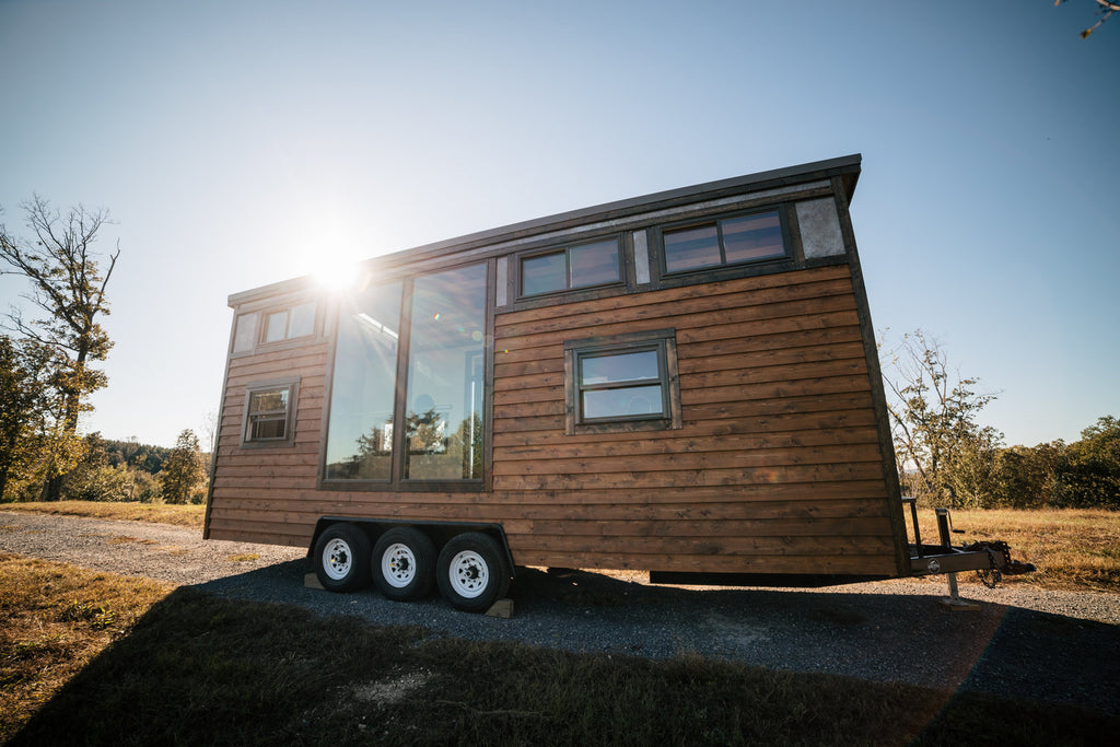 Silhouette Tiny House on Wheels with a Crossfit Gym by Wind River Tiny Homes