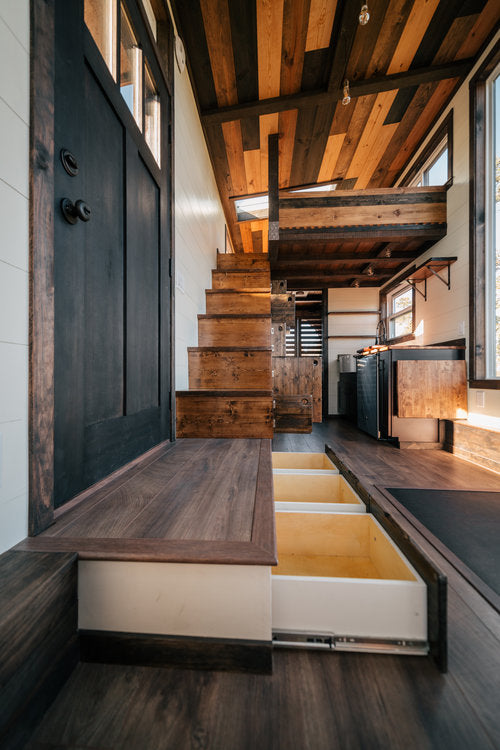 Silhouette Tiny House on Wheels with a Crossfit Gym by Wind River Tiny Homes
