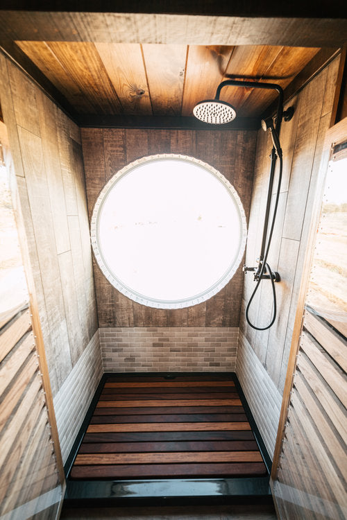 Silhouette Tiny House on Wheels with a Crossfit Gym by Wind River Tiny Homes