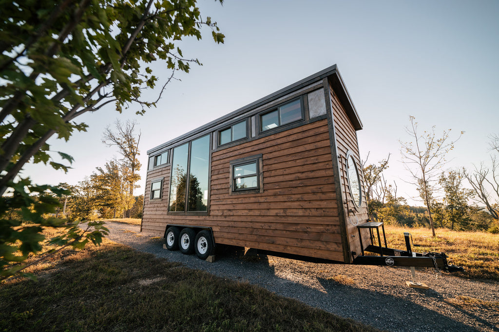 Silhouette Tiny House on Wheels with a Crossfit Gym by Wind River Tiny Homes