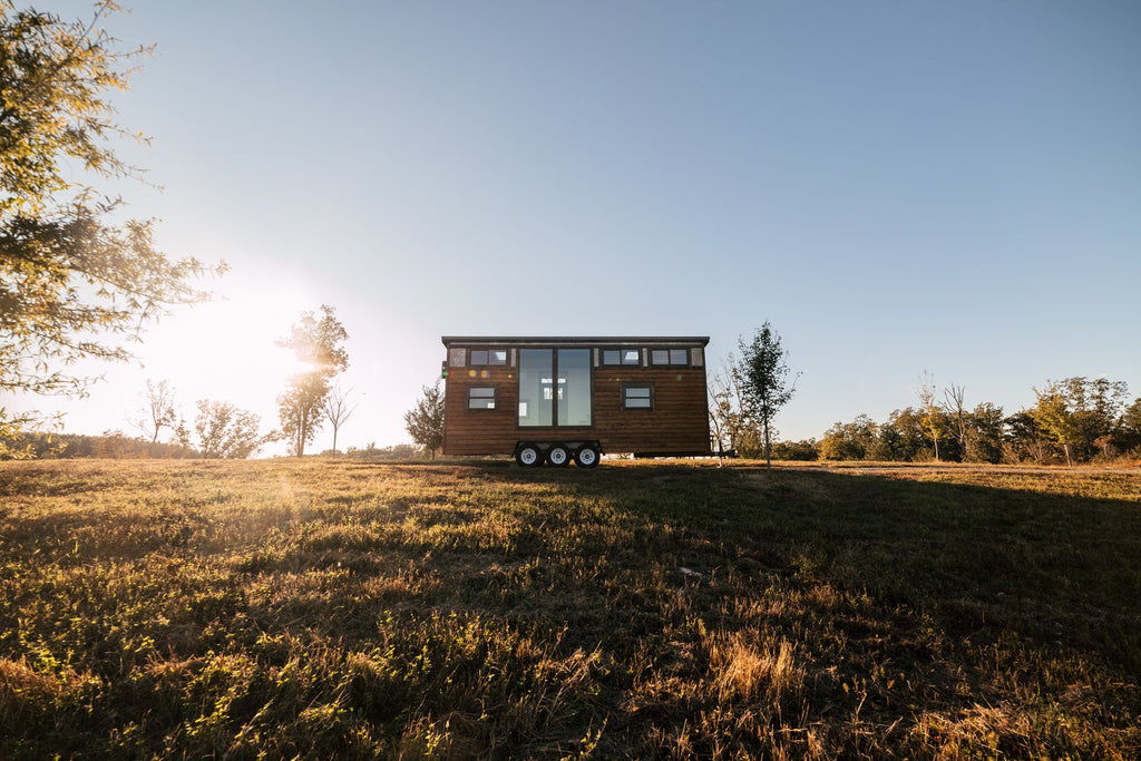 Silhouette Tiny House on Wheels with a Crossfit Gym by Wind River Tiny Homes