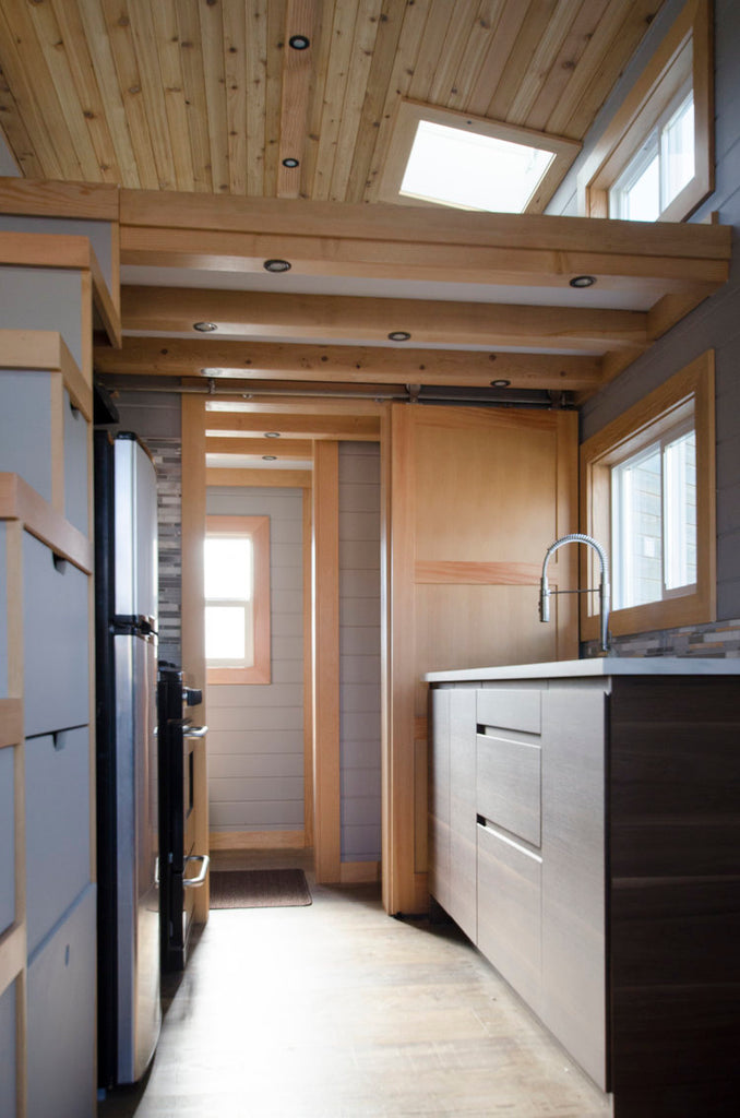 24’ “Blue Heron” Tiny House on Wheels by Rewild Homes