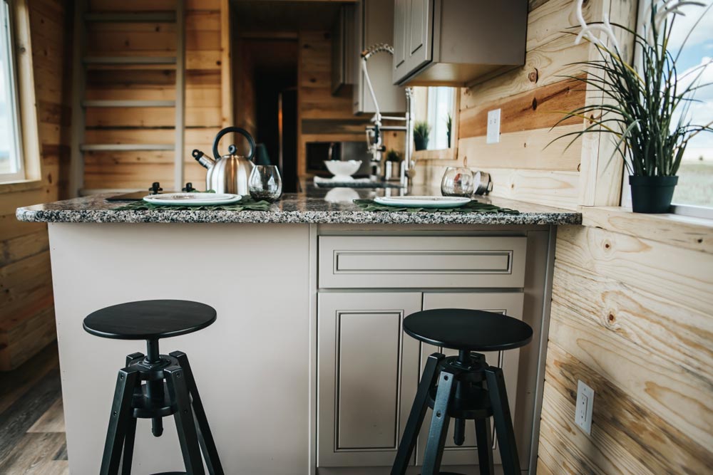 Rustic "Four Eagle" Tiny House on Wheels by The Tiny Home Co.