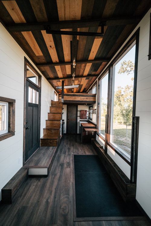 Silhouette Tiny House on Wheels with a Crossfit Gym by Wind River Tiny Homes