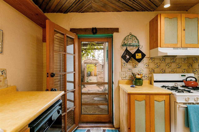 Santa Fe Pueblo Style Tiny Home Interior - Screened Door