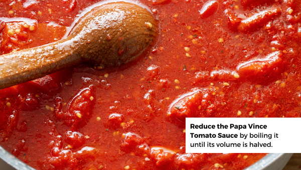 Reduce the Papa Vince Cherry Tomato Sauce by boiling it until its volume is halved.