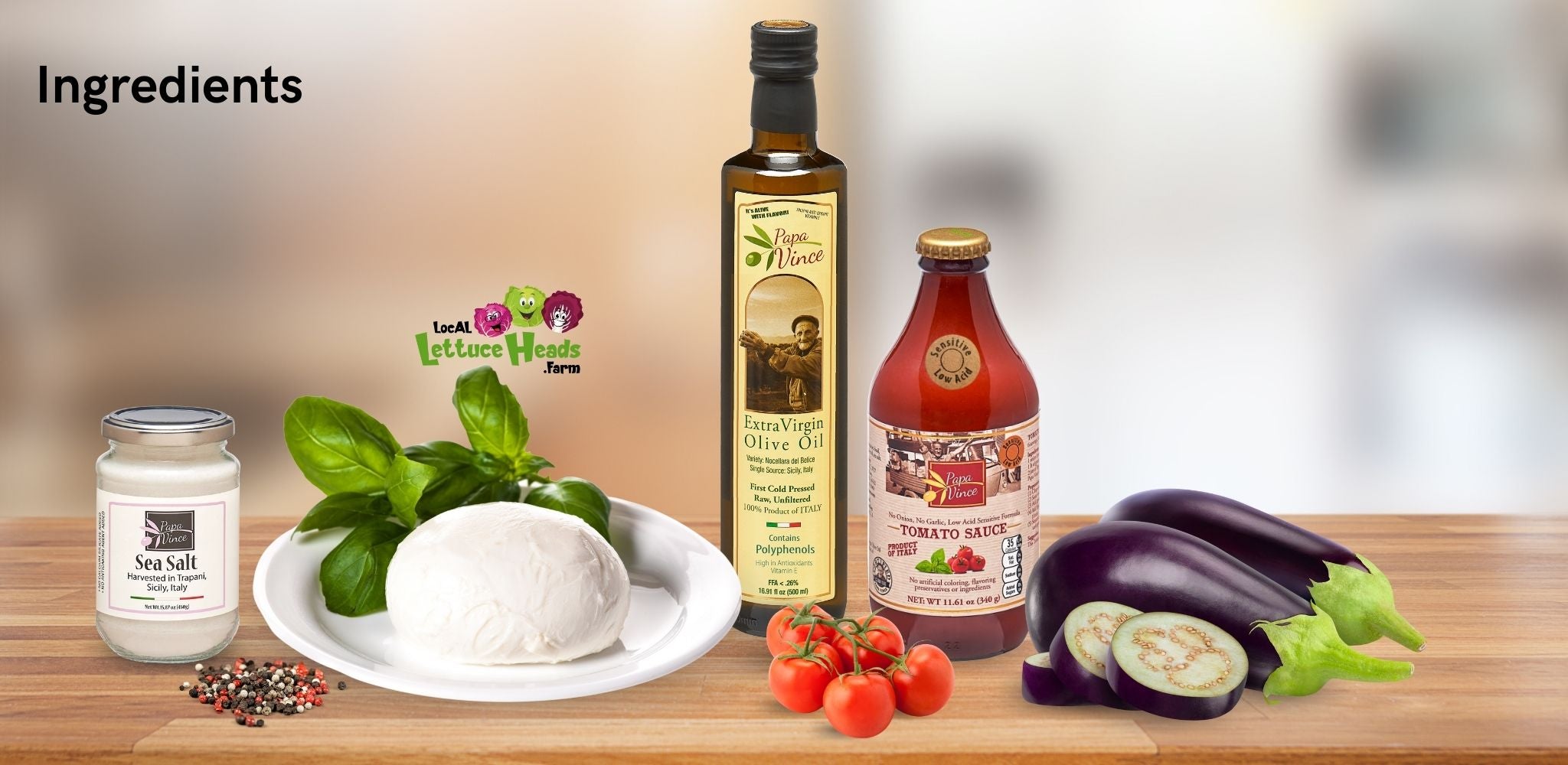 Ingredients for making Eggplant Pizzas: sea salt, black pepper, mozzarella cheese, hydroponic genovese basil, olive oil extra virgin, cherry tomato sauce with no onion or garlic, cherry tomatoes and eggplants