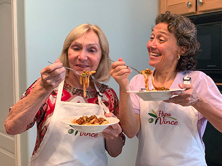 Grandma and Daughter Vitina eating pasta bolognese
