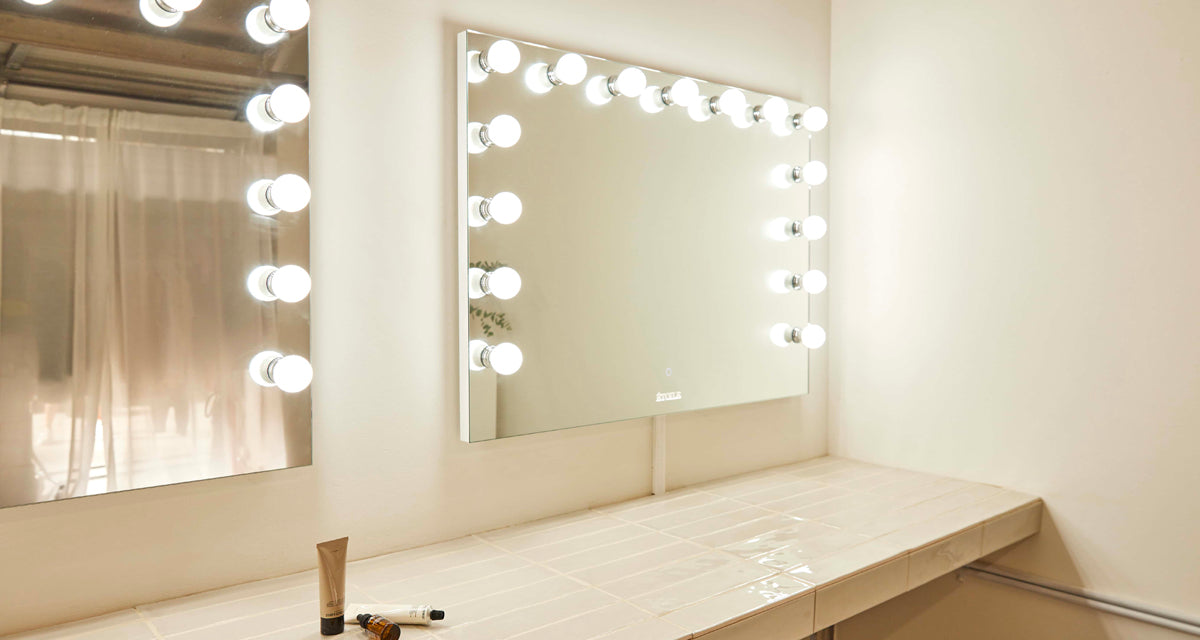 mounting a makeup vanity mirror on the wall