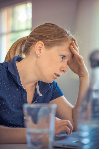 anxious woman working