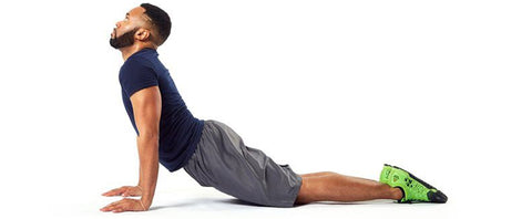 man doing back extension stretch