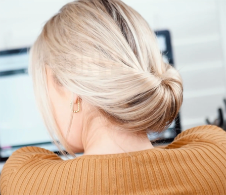 Classic French Roll hairstyle created with PONY-O bendable hair tie and ponytail holder