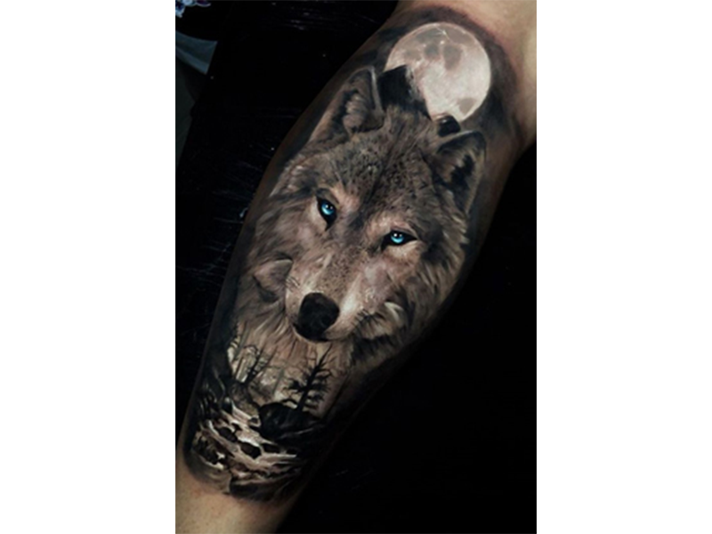 native american wolf howling at moon tattoos