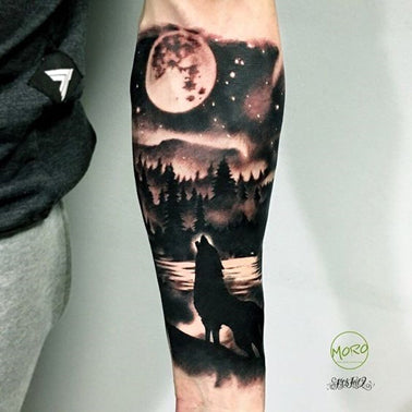 native american wolf howling at moon tattoos