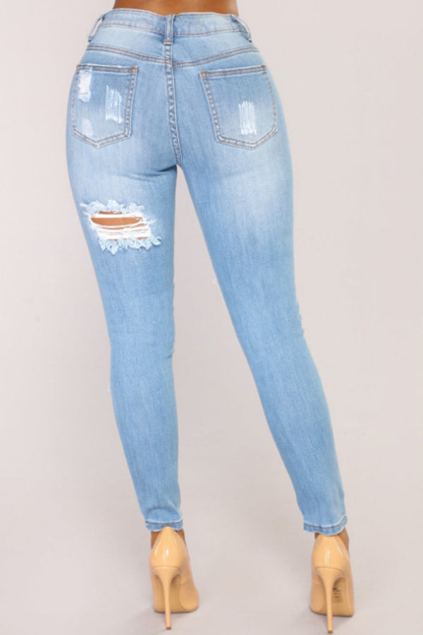 light blue ripped denim jeans