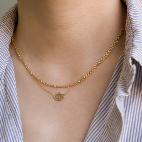 half moon signet yellow gold necklace on model