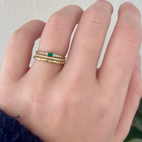 Petite Equilibrium Emerald Baguette Ring stack on finger