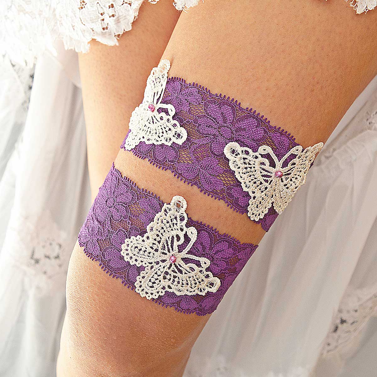 white wedding dress with purple butterflies