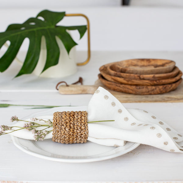 Cream linen napkin in napkin ring from Artha Collections