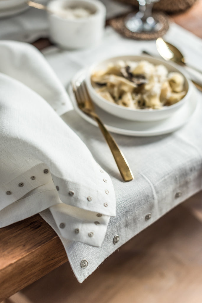 Cream linen napkin detail from Artha Collections