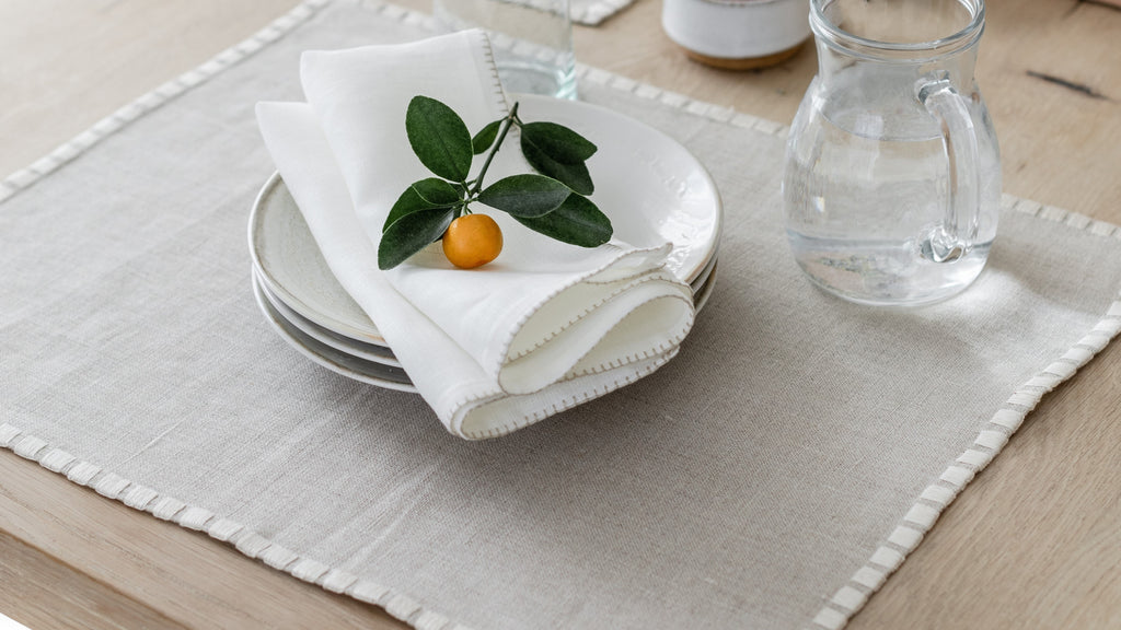 Linen napkins folded by Artha Collections