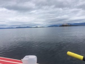 Behind the lighthouse is Alaska!! Colin's getting very close to completing the R2AK.