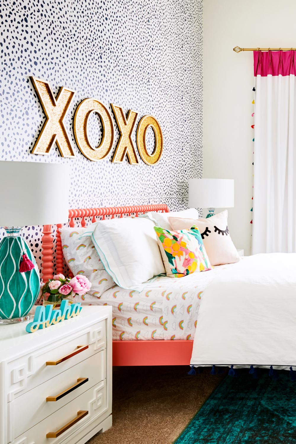 Bright and colorful teen bedroom with neutral wallpaper